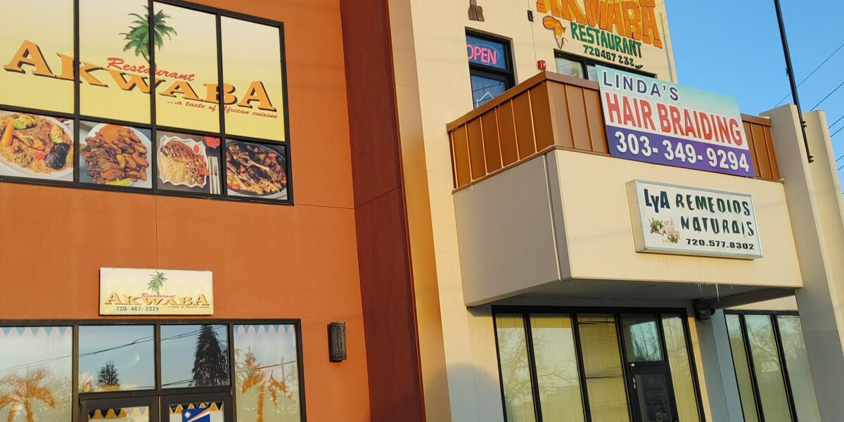 Entrance of Akwaba Restaurant in Aurora showcasing welcoming West African vibes and design.