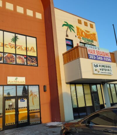 Entrance of Akwaba Restaurant in Aurora showcasing welcoming West African vibes and design.