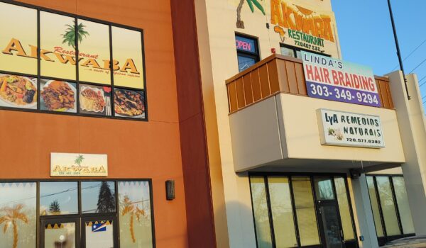 Entrance of Akwaba Restaurant in Aurora showcasing welcoming West African vibes and design.